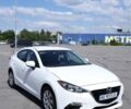 Белый Мазда 3, объемом двигателя 2 л и пробегом 126 тыс. км за 11800 $, фото 1 на Automoto.ua