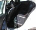 Білий Мазда 3, об'ємом двигуна 2 л та пробігом 98 тис. км за 2392 $, фото 10 на Automoto.ua