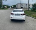 Белый Мазда 3, объемом двигателя 2 л и пробегом 196 тыс. км за 10900 $, фото 2 на Automoto.ua