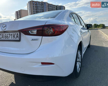 Білий Мазда 3, об'ємом двигуна 2 л та пробігом 156 тис. км за 10799 $, фото 12 на Automoto.ua