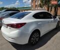 Білий Мазда 3, об'ємом двигуна 2 л та пробігом 125 тис. км за 12000 $, фото 4 на Automoto.ua