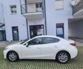 Белый Мазда 3, объемом двигателя 1.5 л и пробегом 98 тыс. км за 14029 $, фото 1 на Automoto.ua
