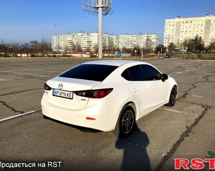 Белый Мазда 3, объемом двигателя 2 л и пробегом 139 тыс. км за 11000 $, фото 3 на Automoto.ua