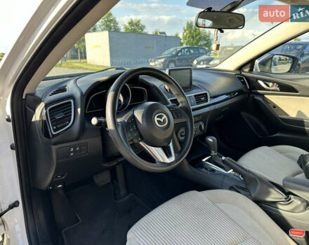 Білий Мазда 3, об'ємом двигуна 2 л та пробігом 156 тис. км за 10799 $, фото 15 на Automoto.ua