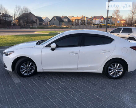 Белый Мазда 3, объемом двигателя 2 л и пробегом 118 тыс. км за 11000 $, фото 19 на Automoto.ua