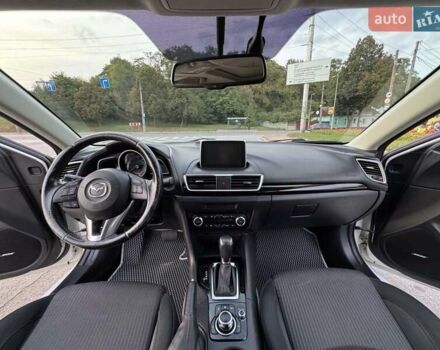 Белый Мазда 3, объемом двигателя 2 л и пробегом 178 тыс. км за 12900 $, фото 16 на Automoto.ua