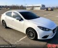 Белый Мазда 3, объемом двигателя 2 л и пробегом 139 тыс. км за 11000 $, фото 1 на Automoto.ua