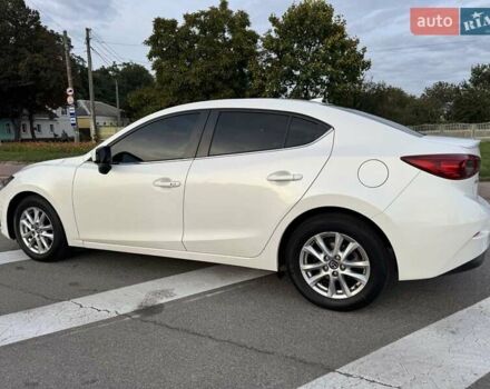 Белый Мазда 3, объемом двигателя 2 л и пробегом 178 тыс. км за 12900 $, фото 1 на Automoto.ua