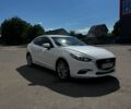Белый Мазда 3, объемом двигателя 2 л и пробегом 107 тыс. км за 14000 $, фото 1 на Automoto.ua