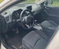 Белый Мазда 3, объемом двигателя 2 л и пробегом 196 тыс. км за 10900 $, фото 5 на Automoto.ua