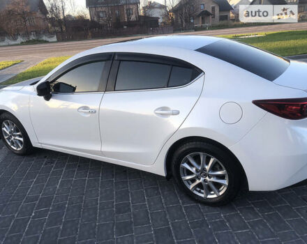 Белый Мазда 3, объемом двигателя 2 л и пробегом 118 тыс. км за 11000 $, фото 5 на Automoto.ua