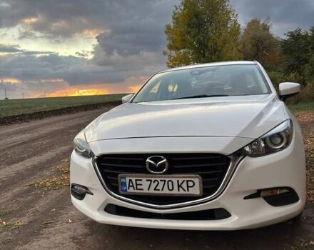 Белый Мазда 3, объемом двигателя 2 л и пробегом 143 тыс. км за 12900 $, фото 1 на Automoto.ua