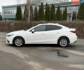 Білий Мазда 3, об'ємом двигуна 2 л та пробігом 170 тис. км за 10400 $, фото 2 на Automoto.ua