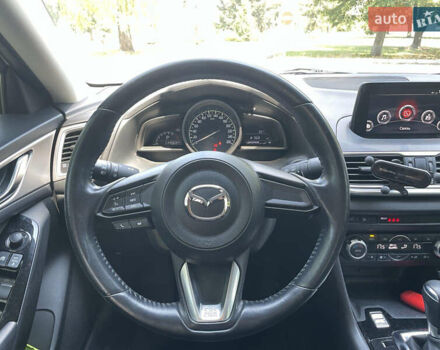 Білий Мазда 3, об'ємом двигуна 1.6 л та пробігом 116 тис. км за 13000 $, фото 13 на Automoto.ua