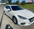 Белый Мазда 3, объемом двигателя 2 л и пробегом 166 тыс. км за 12500 $, фото 2 на Automoto.ua