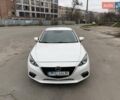 Белый Мазда 3, объемом двигателя 2 л и пробегом 142 тыс. км за 9000 $, фото 1 на Automoto.ua