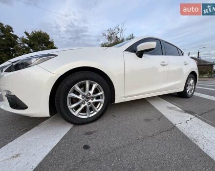 Белый Мазда 3, объемом двигателя 2 л и пробегом 178 тыс. км за 12900 $, фото 4 на Automoto.ua