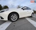 Белый Мазда 3, объемом двигателя 2 л и пробегом 178 тыс. км за 12900 $, фото 4 на Automoto.ua