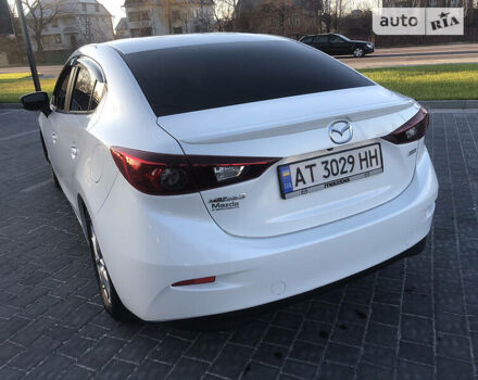 Белый Мазда 3, объемом двигателя 2 л и пробегом 118 тыс. км за 11000 $, фото 4 на Automoto.ua