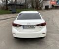Белый Мазда 3, объемом двигателя 2 л и пробегом 142 тыс. км за 9000 $, фото 4 на Automoto.ua