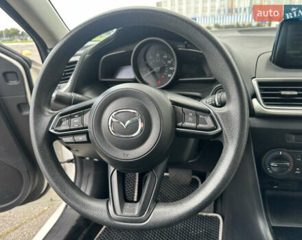Білий Мазда 3, об'ємом двигуна 2 л та пробігом 80 тис. км за 10500 $, фото 24 на Automoto.ua