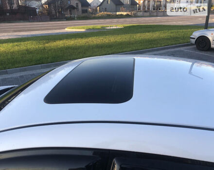 Белый Мазда 3, объемом двигателя 2 л и пробегом 118 тыс. км за 11000 $, фото 10 на Automoto.ua