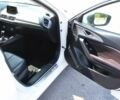 Білий Мазда 3, об'ємом двигуна 2 л та пробігом 98 тис. км за 2392 $, фото 9 на Automoto.ua