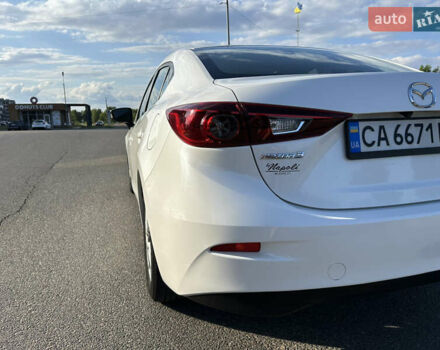 Білий Мазда 3, об'ємом двигуна 2 л та пробігом 156 тис. км за 10799 $, фото 11 на Automoto.ua