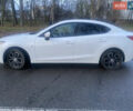 Білий Мазда 3, об'ємом двигуна 2 л та пробігом 120 тис. км за 12500 $, фото 13 на Automoto.ua