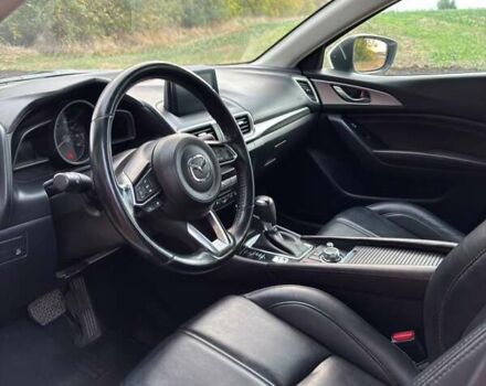 Белый Мазда 3, объемом двигателя 2 л и пробегом 143 тыс. км за 12900 $, фото 9 на Automoto.ua