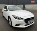 Білий Мазда 3, об'ємом двигуна 1.5 л та пробігом 58 тис. км за 15299 $, фото 1 на Automoto.ua