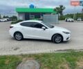 Белый Мазда 3, объемом двигателя 2 л и пробегом 196 тыс. км за 10900 $, фото 3 на Automoto.ua