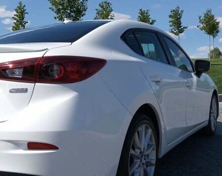 Белый Мазда 3, объемом двигателя 2 л и пробегом 126 тыс. км за 14500 $, фото 1 на Automoto.ua