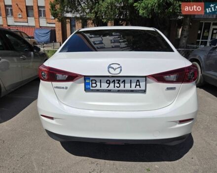 Білий Мазда 3, об'ємом двигуна 2 л та пробігом 125 тис. км за 12000 $, фото 3 на Automoto.ua