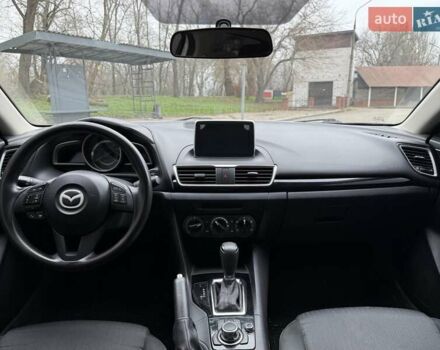 Белый Мазда 3, объемом двигателя 2 л и пробегом 142 тыс. км за 9000 $, фото 14 на Automoto.ua