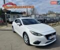 Белый Мазда 3, объемом двигателя 2 л и пробегом 94 тыс. км за 11999 $, фото 1 на Automoto.ua