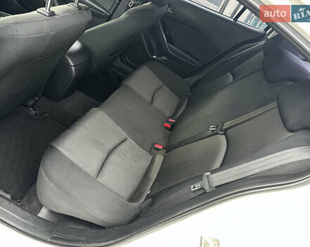 Белый Мазда 3, объемом двигателя 2 л и пробегом 196 тыс. км за 11000 $, фото 20 на Automoto.ua