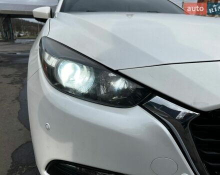 Білий Мазда 3, об'ємом двигуна 2 л та пробігом 197 тис. км за 9999 $, фото 3 на Automoto.ua