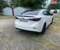Белый Мазда 3, объемом двигателя 2 л и пробегом 184 тыс. км за 10800 $, фото 4 на Automoto.ua