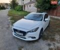 Белый Мазда 3, объемом двигателя 2.5 л и пробегом 150 тыс. км за 12900 $, фото 4 на Automoto.ua