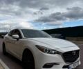 Белый Мазда 3, объемом двигателя 2 л и пробегом 196 тыс. км за 11000 $, фото 1 на Automoto.ua