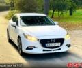 Белый Мазда 3, объемом двигателя 2 л и пробегом 139 тыс. км за 11950 $, фото 1 на Automoto.ua