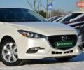 Белый Мазда 3, объемом двигателя 2 л и пробегом 90 тыс. км за 12999 $, фото 1 на Automoto.ua