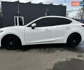 Белый Мазда 3, объемом двигателя 2 л и пробегом 196 тыс. км за 11000 $, фото 6 на Automoto.ua