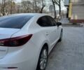 Білий Мазда 3, об'ємом двигуна 2 л та пробігом 63 тис. км за 13700 $, фото 12 на Automoto.ua
