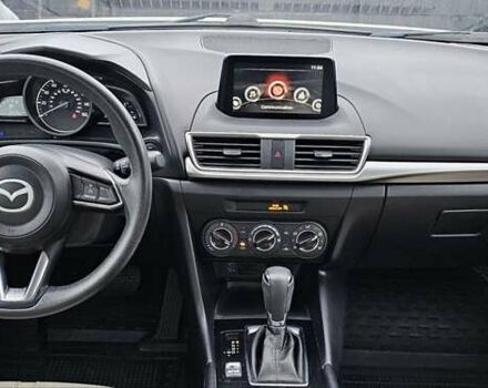 Белый Мазда 3, объемом двигателя 2 л и пробегом 130 тыс. км за 9900 $, фото 9 на Automoto.ua