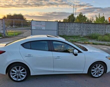 Белый Мазда 3, объемом двигателя 2 л и пробегом 193 тыс. км за 12800 $, фото 3 на Automoto.ua