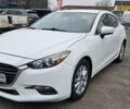 Белый Мазда 3, объемом двигателя 2 л и пробегом 130 тыс. км за 9900 $, фото 1 на Automoto.ua
