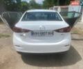 Белый Мазда 3, объемом двигателя 2 л и пробегом 213 тыс. км за 11000 $, фото 3 на Automoto.ua