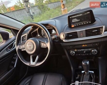 Белый Мазда 3, объемом двигателя 2 л и пробегом 193 тыс. км за 12800 $, фото 12 на Automoto.ua